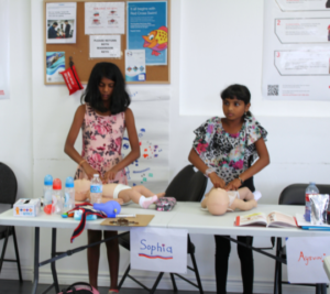 Students practising first aid during a Canadian Red Cross Babysitting course