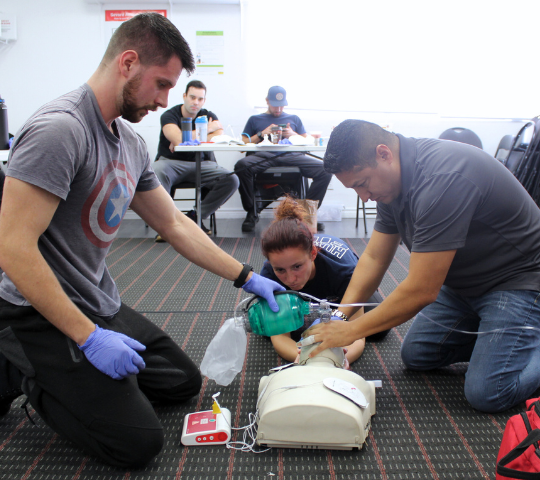 Bag-valve-mask ventilation practised on an adult manikin in a BLS course