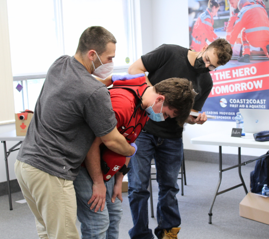 Choking relief techniques practised during a First Responder course in Scarborough