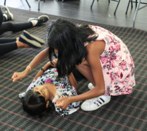 Children learning to recognize and respond to an emergency in a Stay Safe course