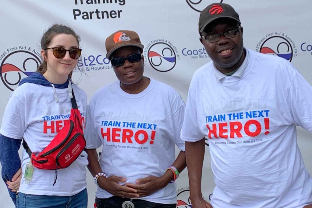 Volunteers in Train the Next Hero shirts at the 2024 event in North York