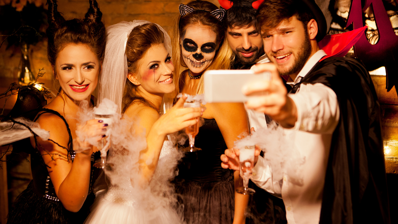 group taking a halloween photo