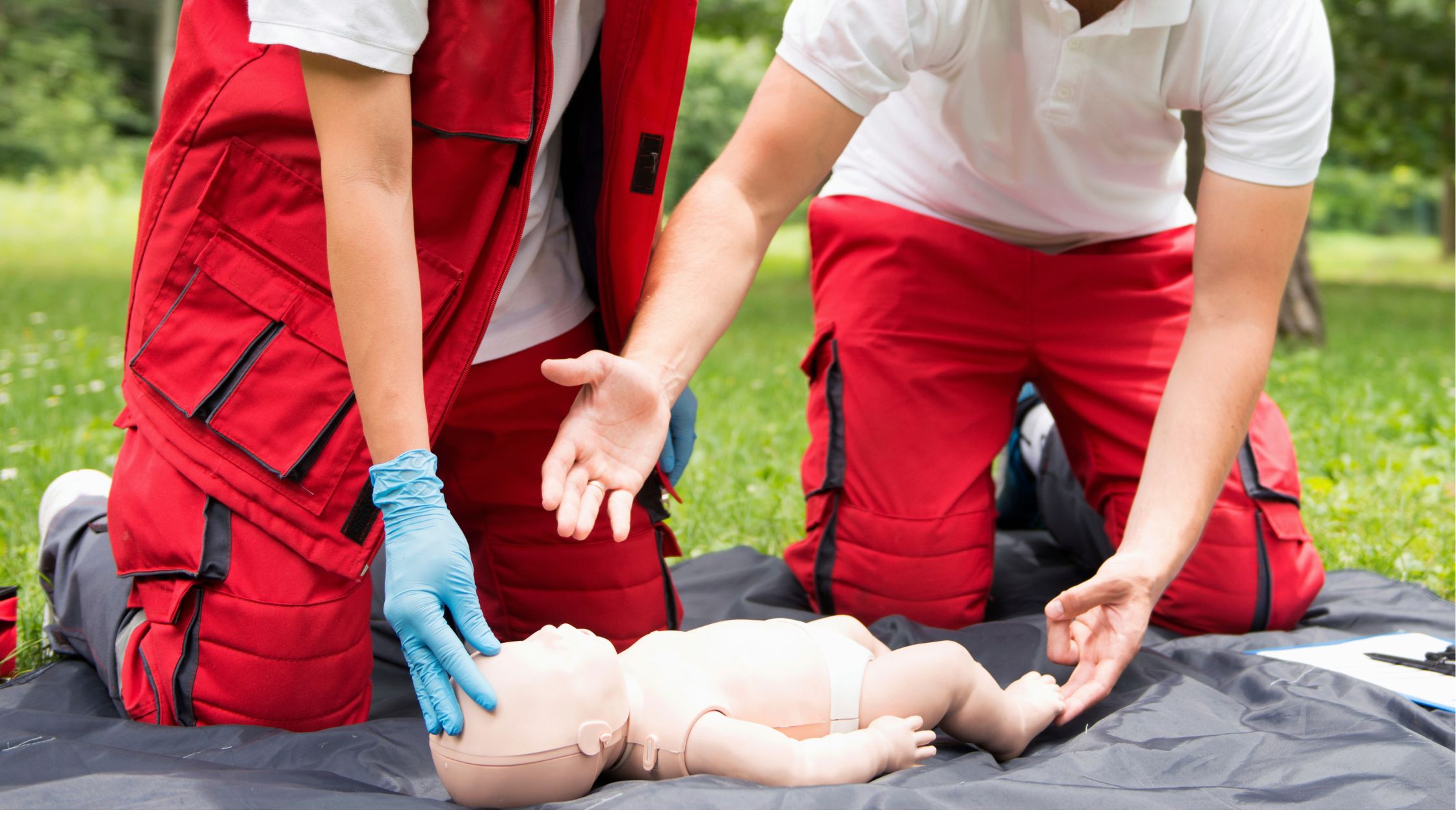 First aid expert teaching hands-only CPR technique at Coast2Coast Canada Day safety booth