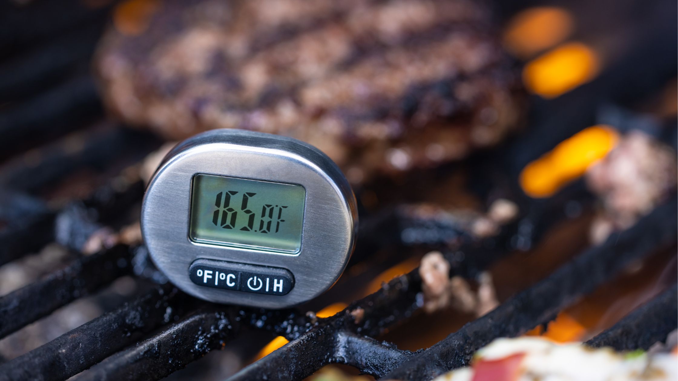 Checking meat thermometer temperature for safe Canada Day BBQ practices