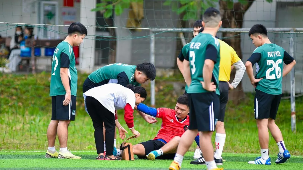 Soccer player with sports injury