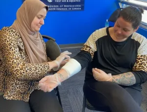 Students practising first aid at the Coast2Coast East York, Toronto facility