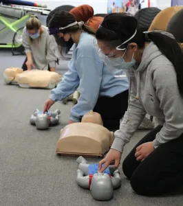 First aid and CPR in progress at the Coast2Coast Milton facility