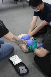 Students practising first aid at the Coast2Coast Milton facility
